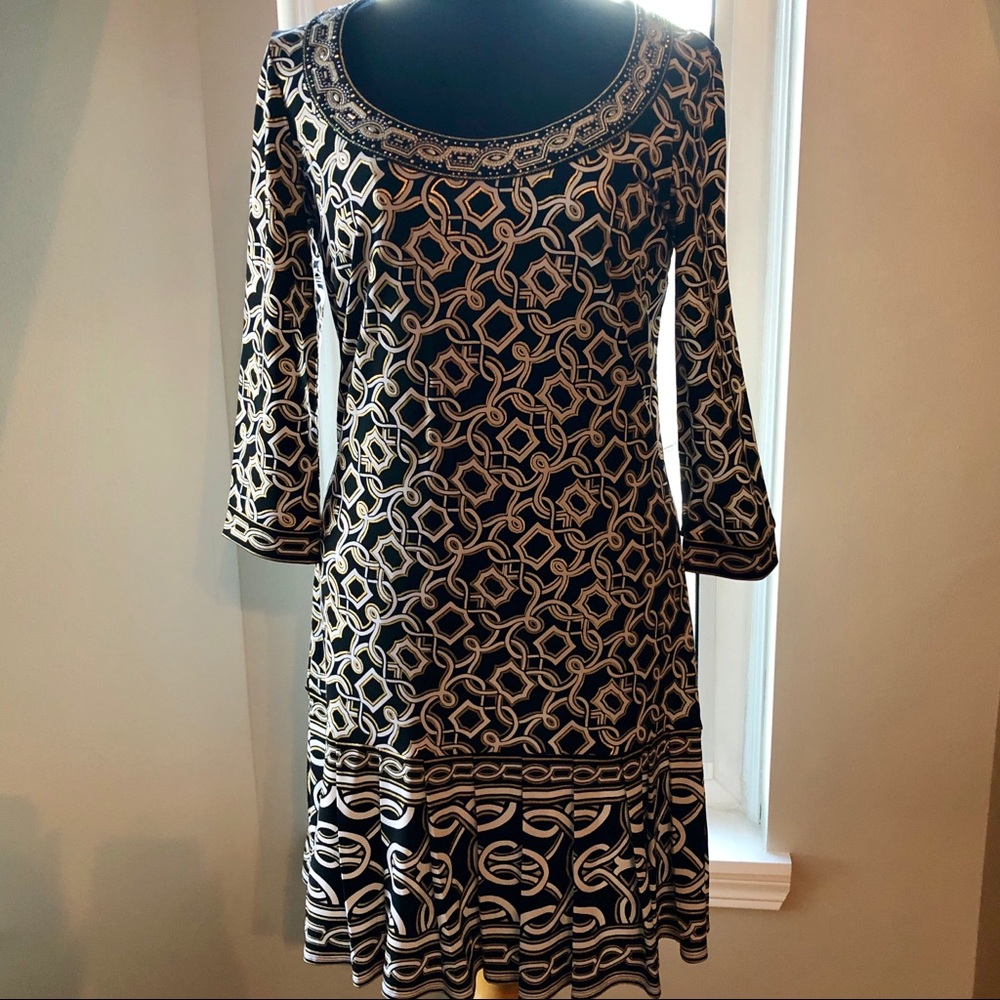Whbm dress has gold metallic & embellishments.